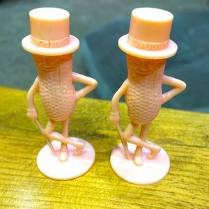 Mr Peanut Salt & Pepper Shakers pink beige cream. Small crack on cap as shown.
